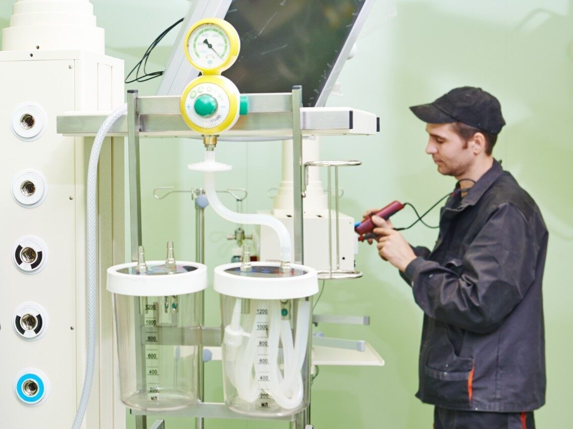 Carpenters,Joiners,With,Screwdriver,Mounting,Equipment,At,Surgery,Room,In